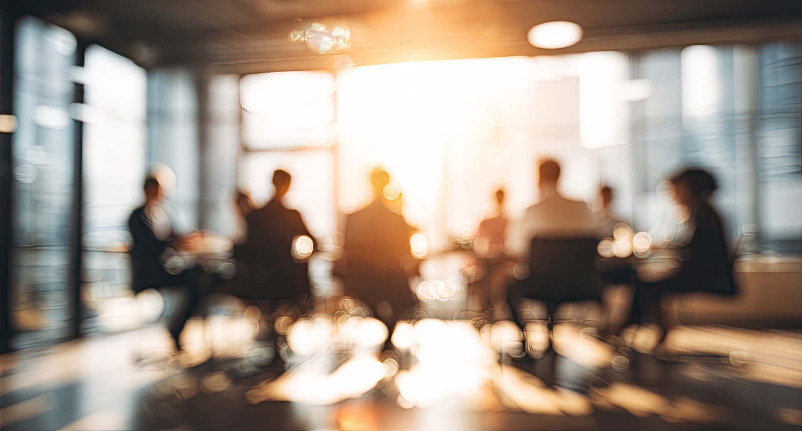 A leadership team in session, warm light